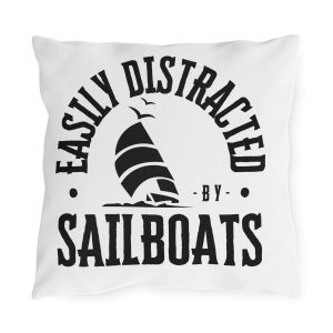 Sailing waterproof pillow with “Easily Distracted by Sailboats” text and sailboat graphic