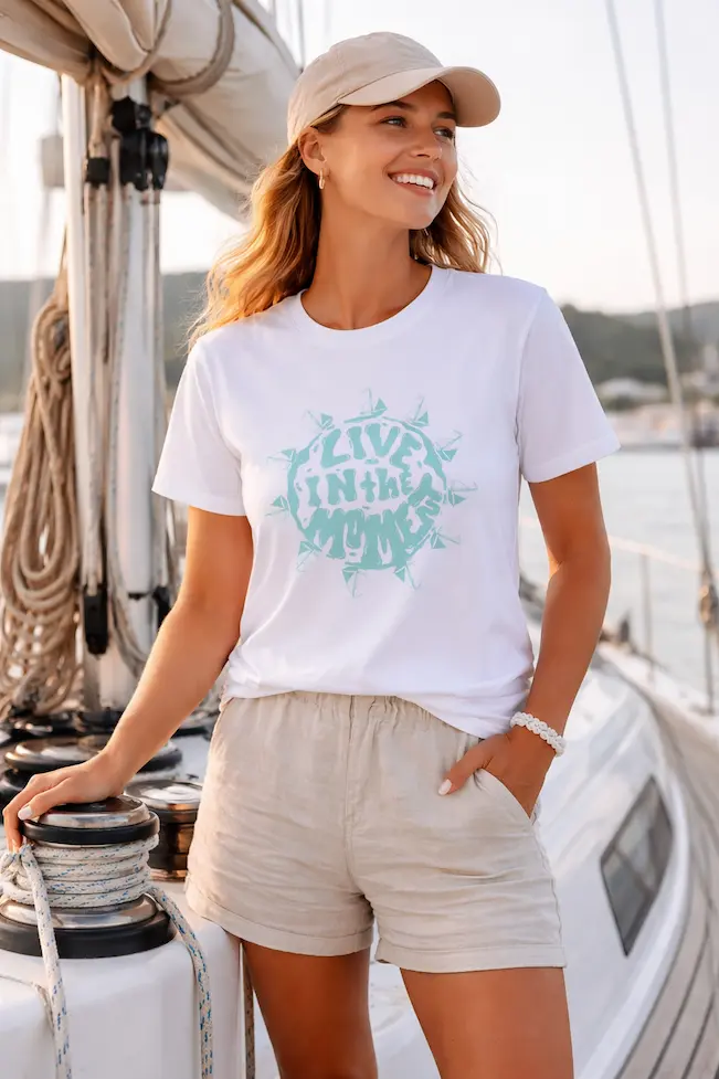 sailing t-shirt placed on boat cockpit in natural light